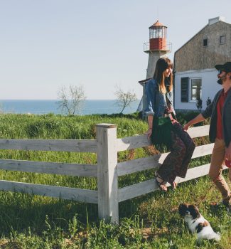 happy-young-stylish-hipster-couple-love-walking-with-dog-countryside-min
